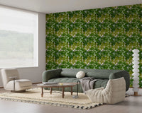 Lush Leaf Canopy Monstera Leaves Wallpaper in a relaxed green sitting room