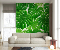 Tropical green wallpaper with large leaves

