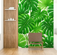 Deep green monstera wallpaper for living room

