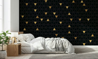 Geometric pattern feature wall of the Luxury Black and Gold Triangles Wall Mural.
