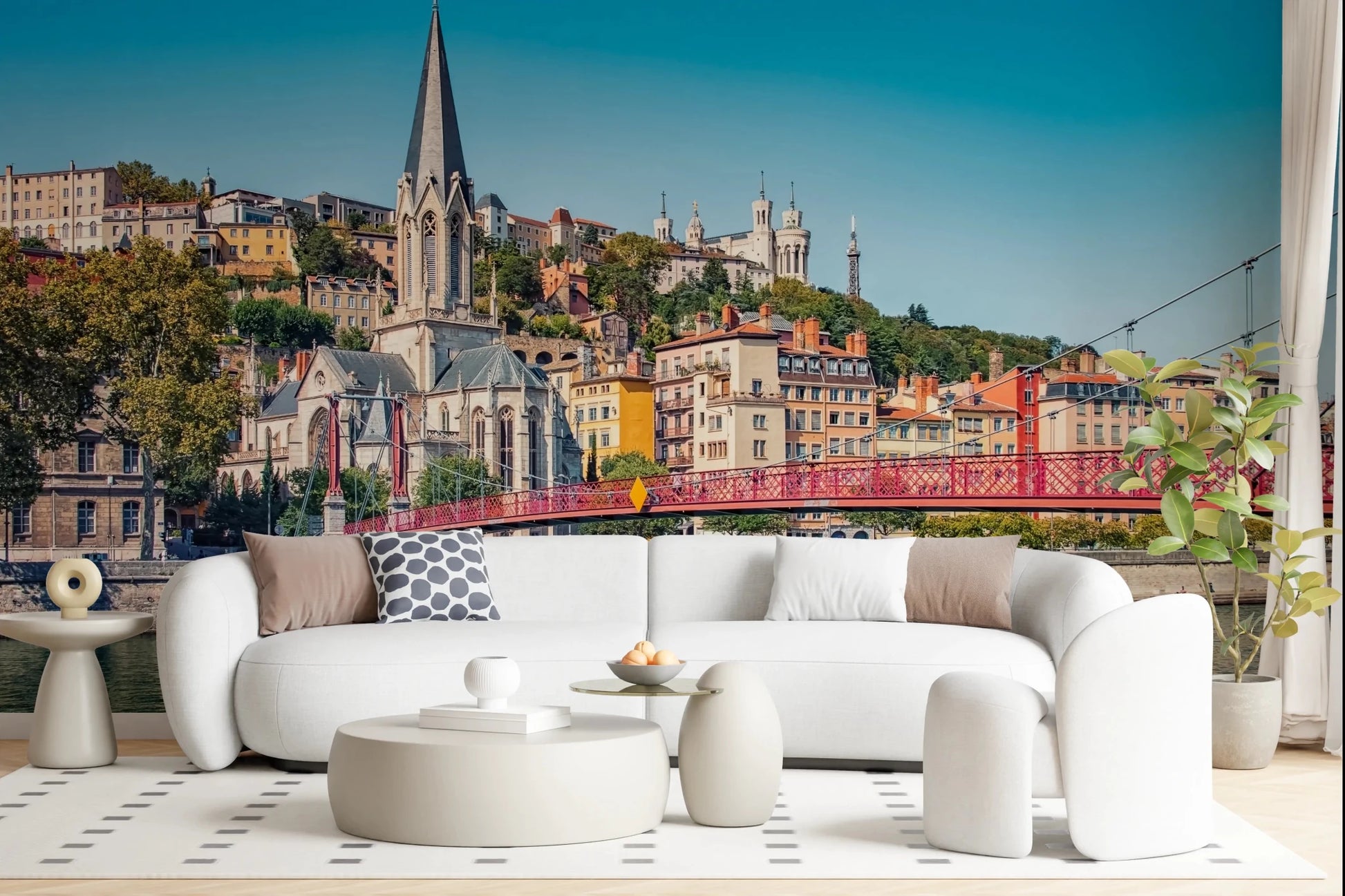 Gothic church spire against a clear blue sky.