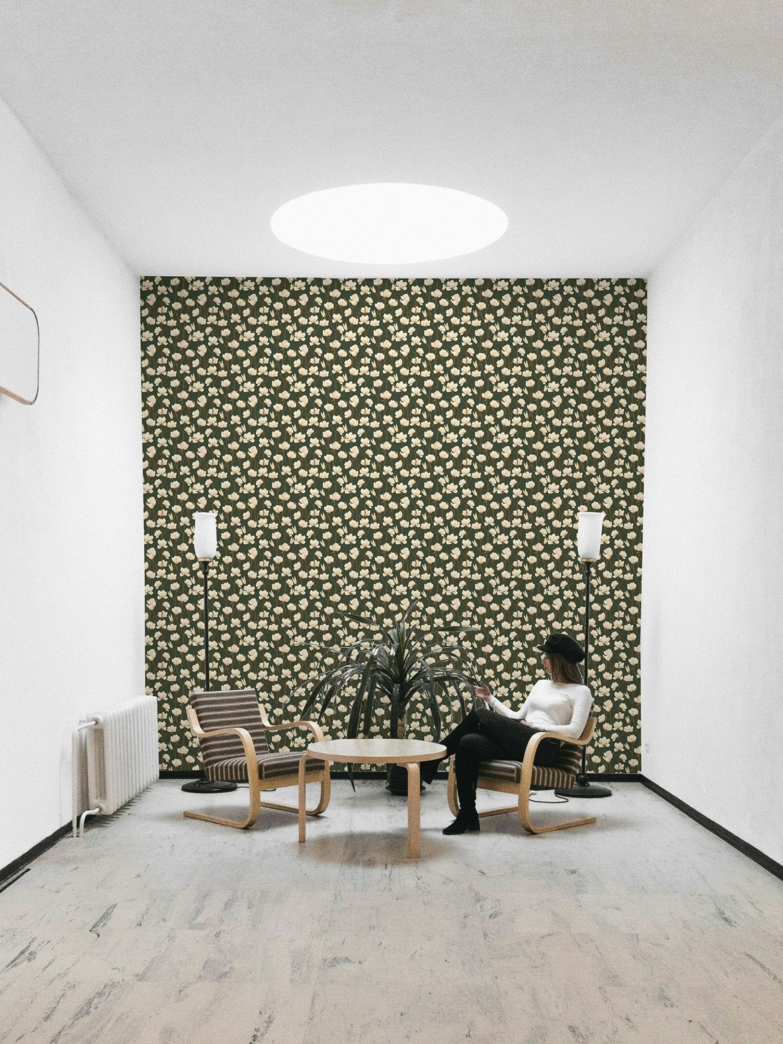 Magnolia Still cream blooms dark green wall

