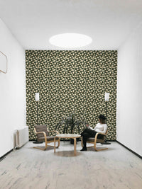 Magnolia Still cream blooms dark green wall

