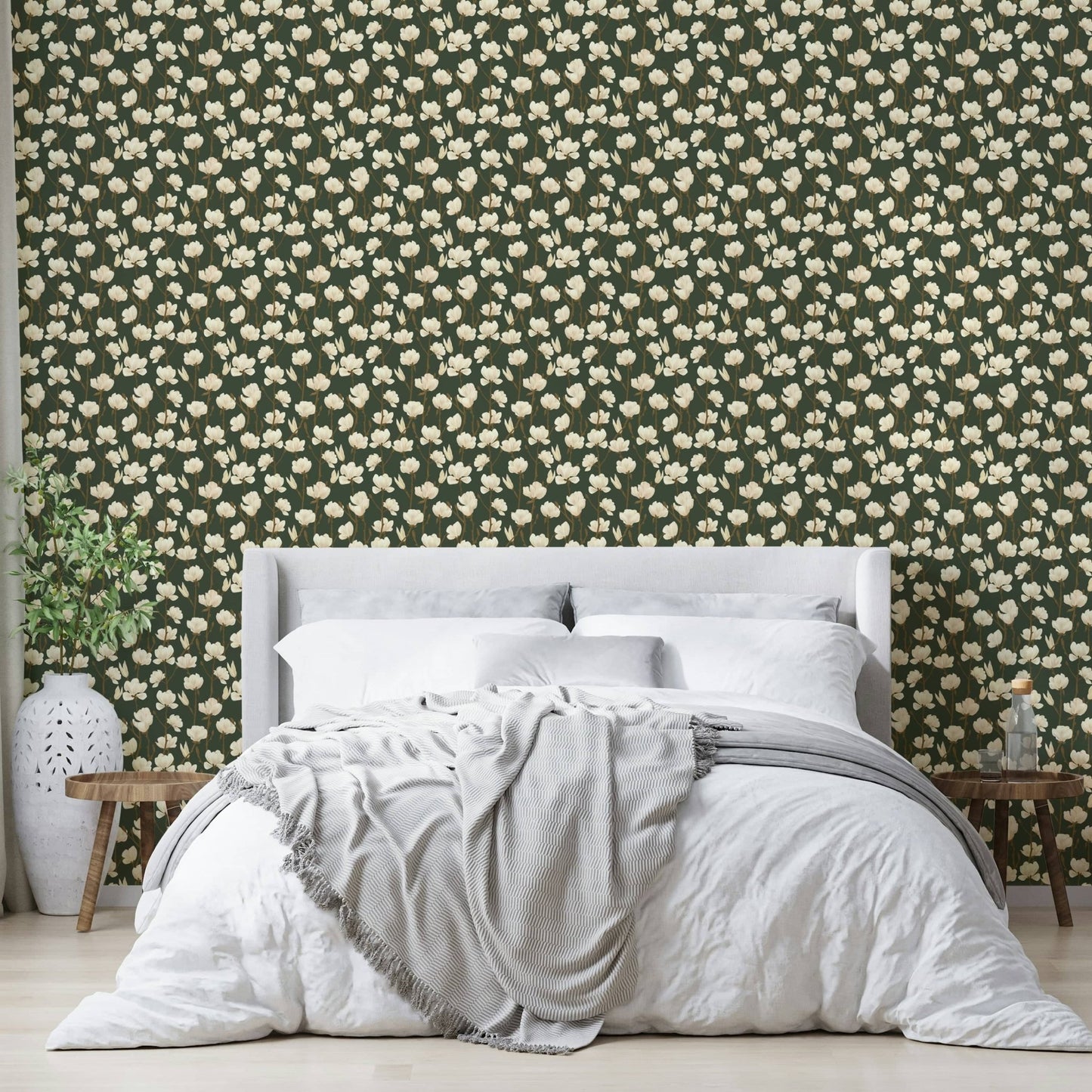 Cream magnolia flowers on green backdrop

