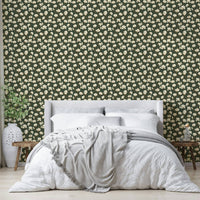 Cream magnolia flowers on green backdrop

