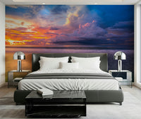 Vivid Storm Clouds sunset wallpaper on water, rich in crimson and violet hues.