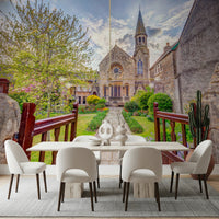 Dining room with Malmesbury Church Wall Mural showing stone building and pathway