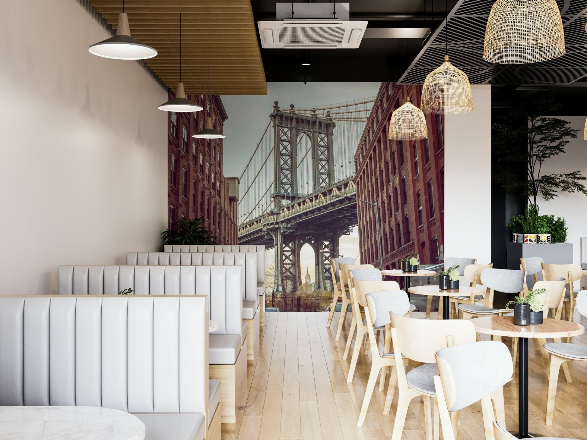 Historic brick buildings framing bridge.

