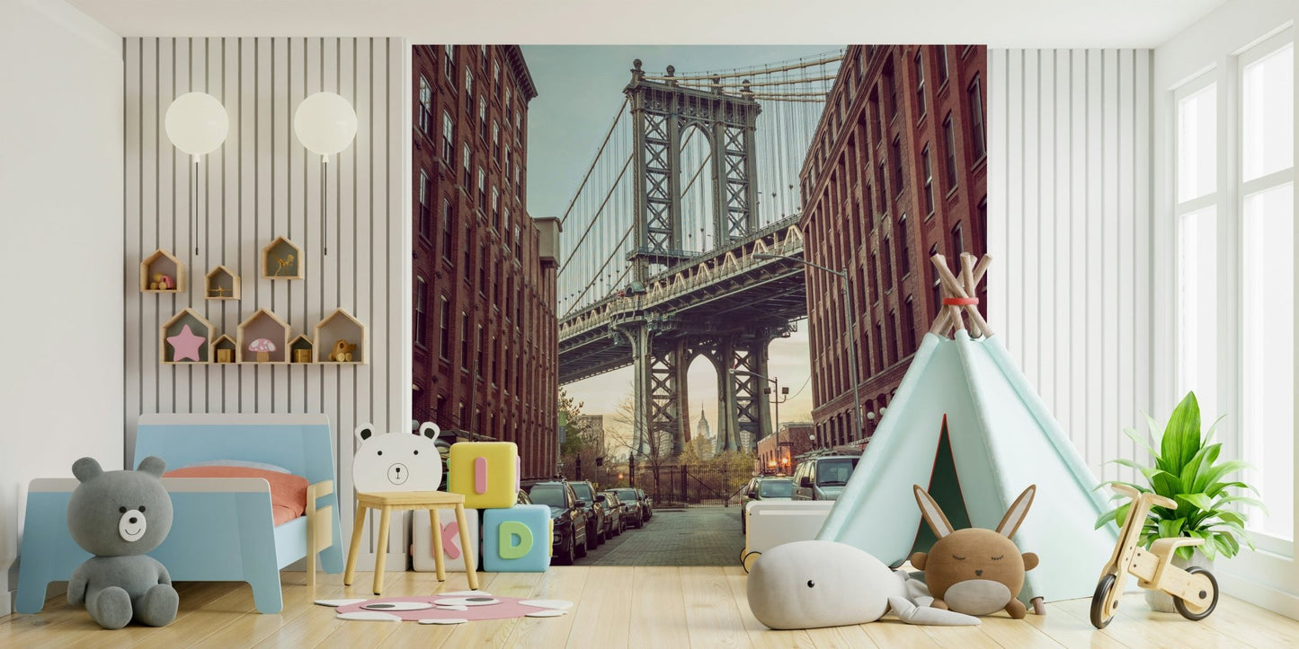 Cobblestone street with bridge in background.

