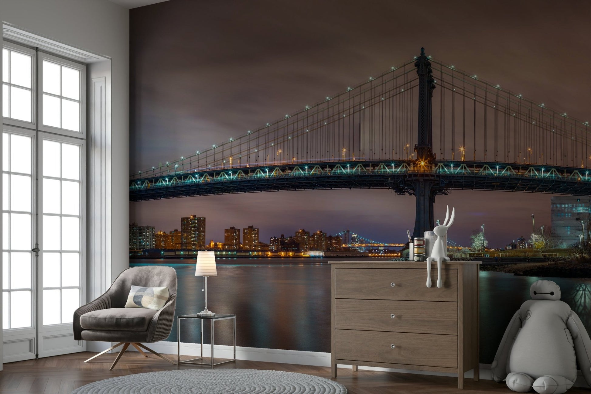 Panoramic nighttime view of the Manhattan Bridge.

