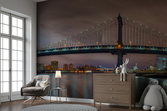 Panoramic nighttime view of the Manhattan Bridge.

