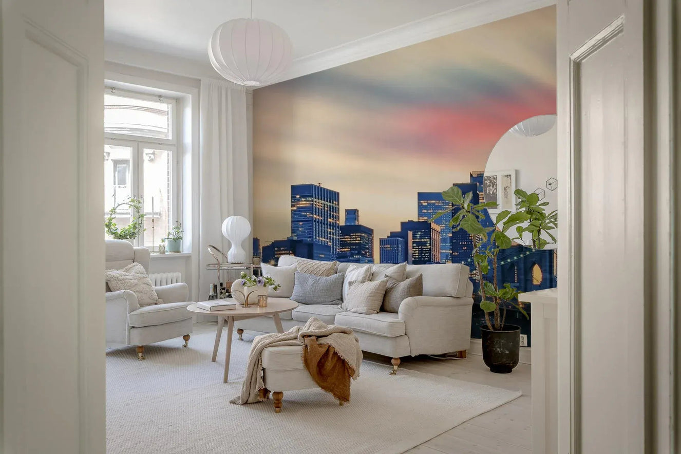 Manhattan City Lights mural in a modern living room with grey furniture.
