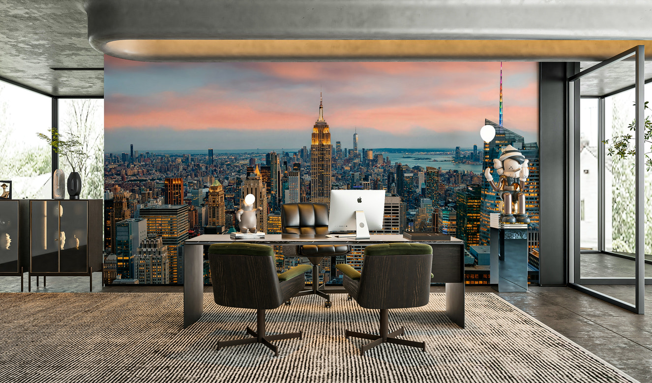 Manhattan skyline glowing at sunset

