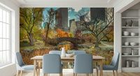 Warm sunset glow on a city skyline wall mural for a modern interior look.