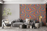 Marble Swirl Groovy Retro Abstract Stripes Colorful Wallpaper accent wall behind a velvet chair.
