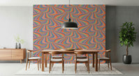 Designer interior featuring the bold Marble Swirl Groovy Retro Abstract Stripes Colorful Wallpaper.