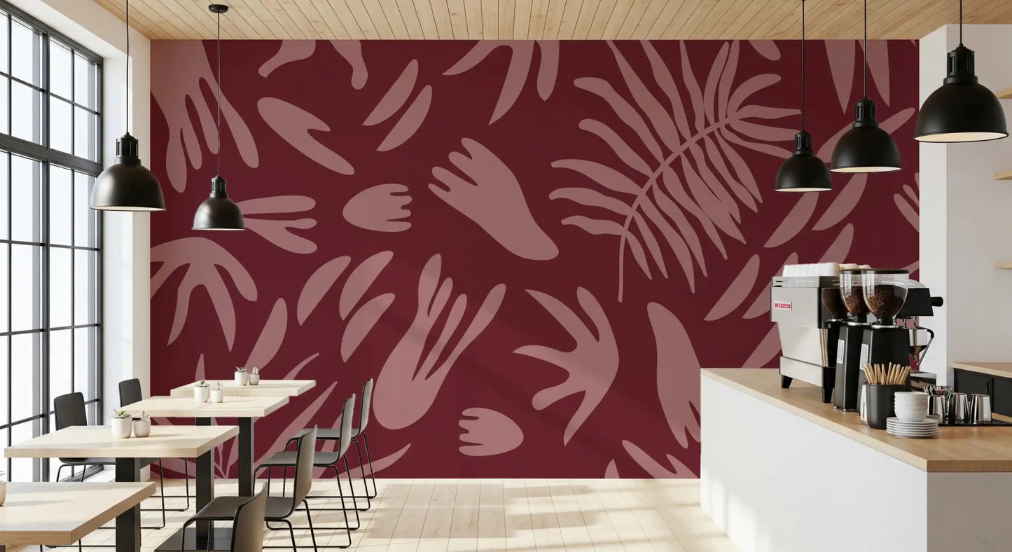 Deep maroon wall mural with blush floral silhouettes and clean rhythm