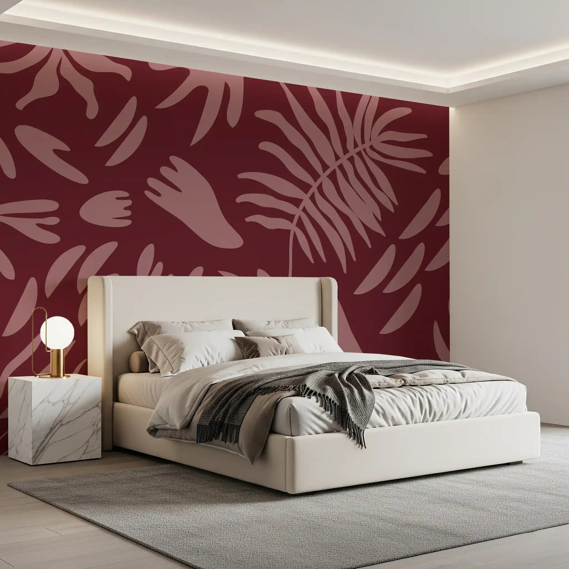 Bedroom wall finished in maroon botanical mural with soft pink forms