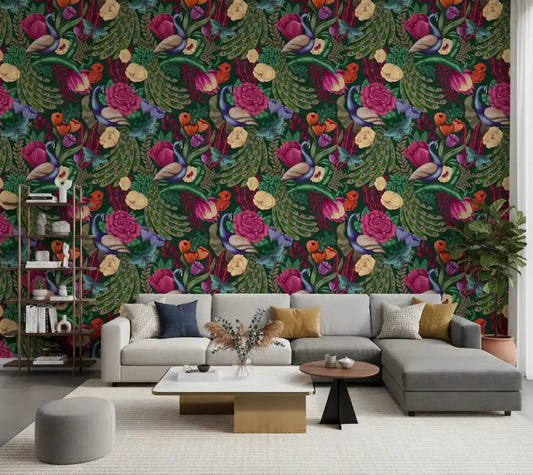 Dark Green Peacock Fantasy Garden Wallpaper behind a soft gray living room sofa