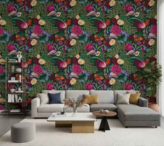 Dark Green Peacock Fantasy Garden Wallpaper behind a soft gray living room sofa