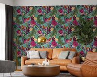 Warm seating area framed by Maximalist Peacock Fantasy Garden Turquoise Wallpaper