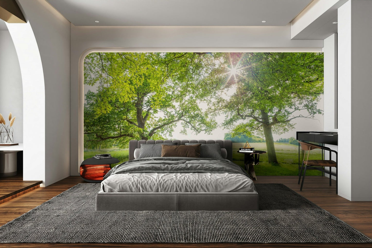 A peaceful wall mural with a meadow scene.

