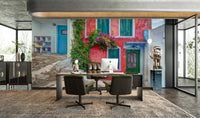An artistic Greek island mural on minimalist wallpaper.

