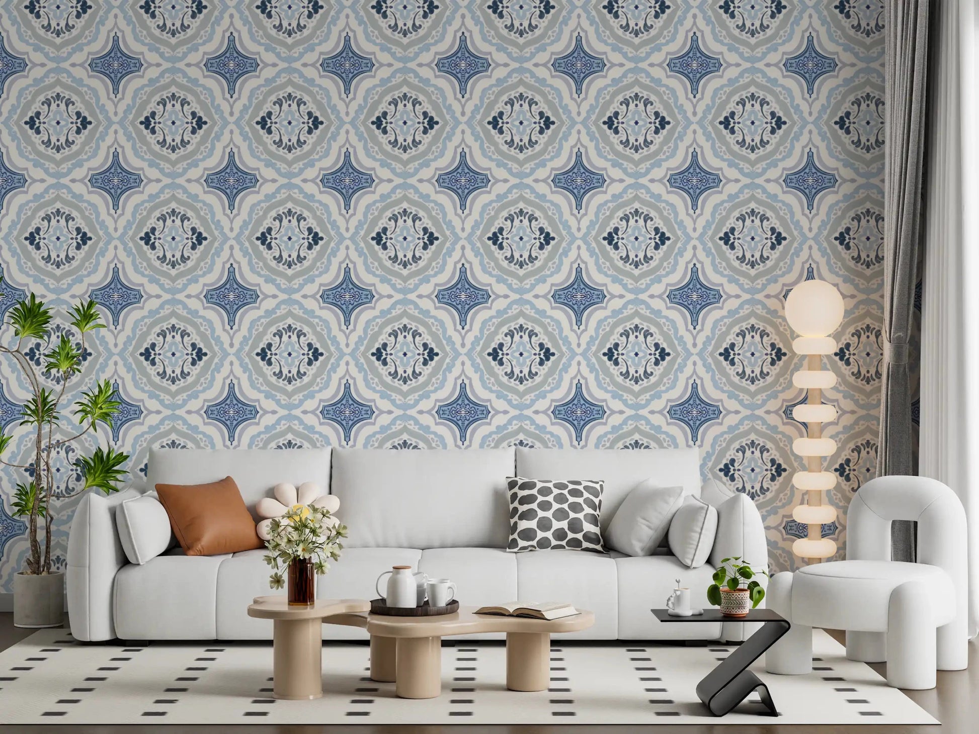 Living area styled with Mediterranean Indigo Fleur Tile Wallpaper and white chairs
