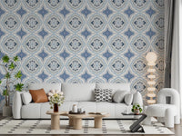 Living area styled with Mediterranean Indigo Fleur Tile Wallpaper and white chairs