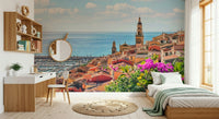Vibrant bougainvillea framing a sunny Mediterranean Village wallpaper.
