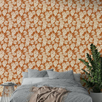 Terracotta-toned vineyard wallpaper for rustic rooms

