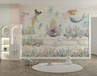 The background is a soft, light blue underwater scene.

