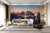 Metropolis Dusk Wall Mural in deep blue and orange tones for lounge.