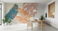 Retro foliage wall mural in muted blue, blush mauve, and warm terracotta tones