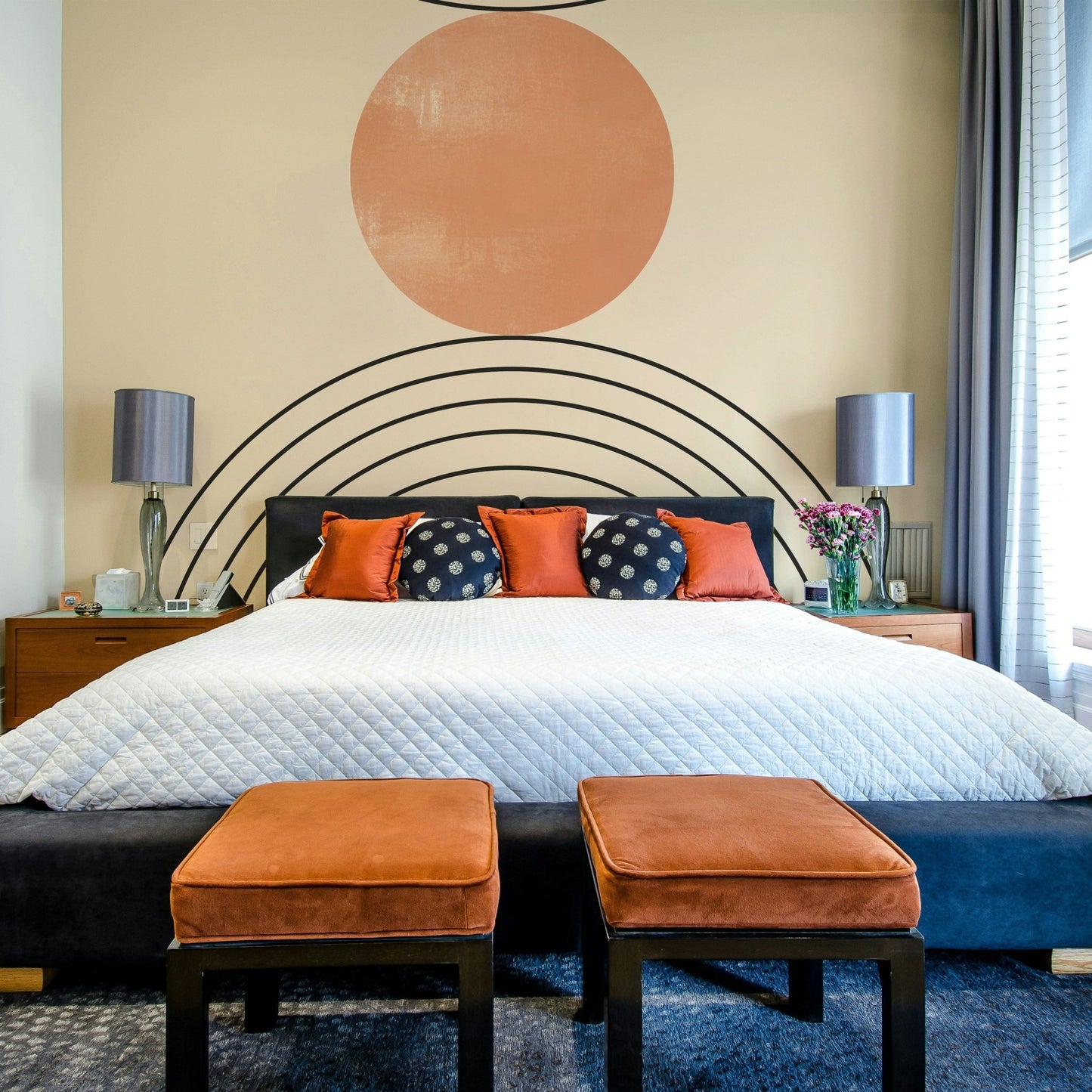 Soft symmetry gives this bedroom a calm look through the Mid-Century wall mural