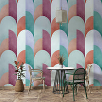 Features geometric shapes  arranged to resemble a sundown or sunset.
