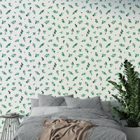 Peel and stick eucalyptus wallpaper on room wall

