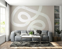 An artistic minimalist loop mural on elegant wallpaper.


