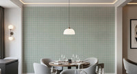 Breezy mint green wallpaper with a woven fabric look.