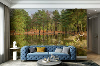 A high-angle view of the wall mural in a large space.

