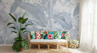 Washed blue palm leaves create a soft Misty Blue Tropical Palm wall mural
