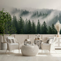 Muted green woodland haze wallpaper for a calm botanical interior.