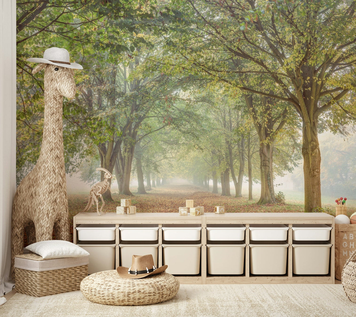 The trees are tall and their forms are softened by the mist.

