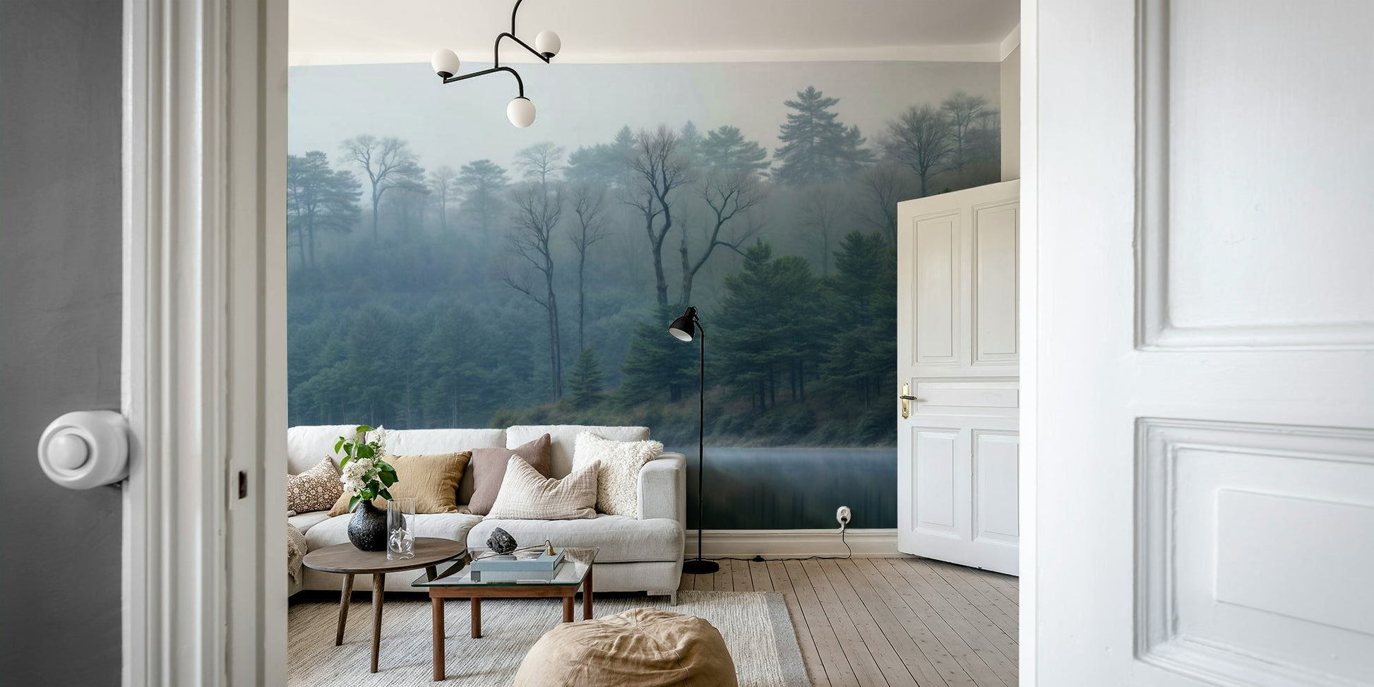 The lake and forest are a central focus of the image.

