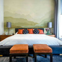 Soft-toned mural of majestic highland terrain

