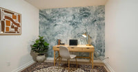 Office space with Misty Pine Forest mural in muted blue grey shades