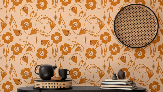 Floral mural in soft peach and orange hues
