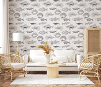 Hallway styled with black and white nautical wallpaper and fish line art detail