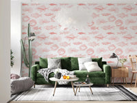 Coastal wallpaper with hand-drawn fish motifs in coral on white