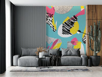 Dynamic wall covering featuring yellow, pink, and black patterns.